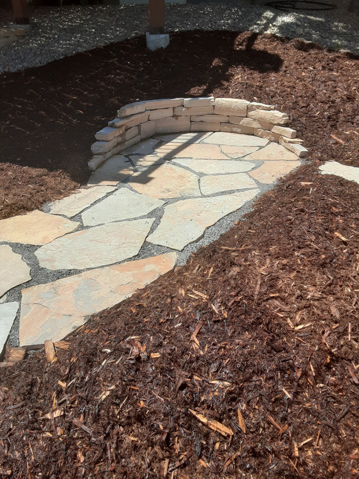 Fort Collins Colorado home with mulch and flagstone pathway from Linden Leaf Landscapes xeriscape design