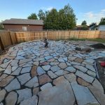 A custom stone patio in Fort Collins made by Linden Leaf Landscapes