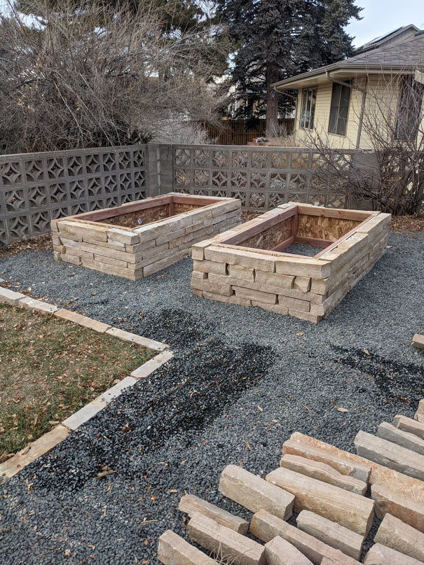 Stone raised planter gardening beds in Fort Collins