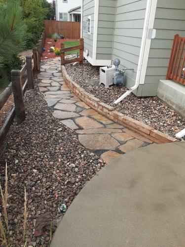 Stone pathway design with rock bed in Fort Collins, CO