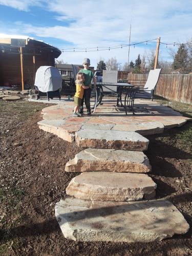 Large stone staircase landscape design in Colorado
