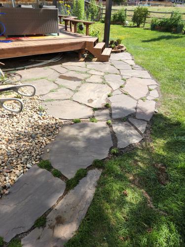 A stone patio by Linden Leaf Landscapes in Colorado