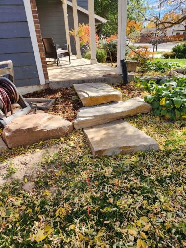 Large stone staircase and mulch bed in Fort Collins, CO