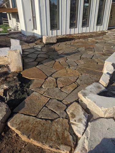 Rock patio landscape design remodel in Fort Collins