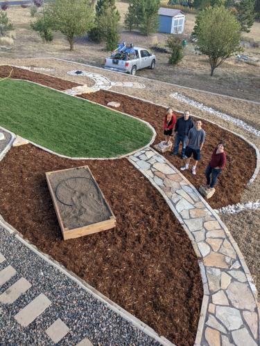 Colorado landscape design mulch and sod with stone pathway