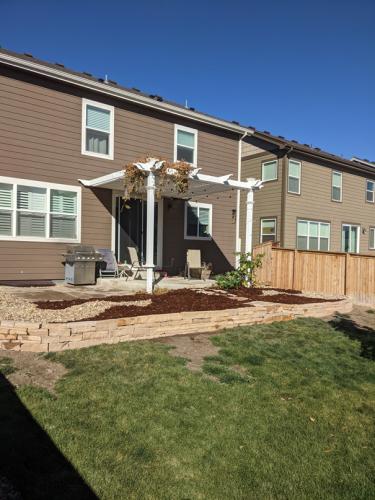 Landscape design retaining wall and xeriscape in Colorado