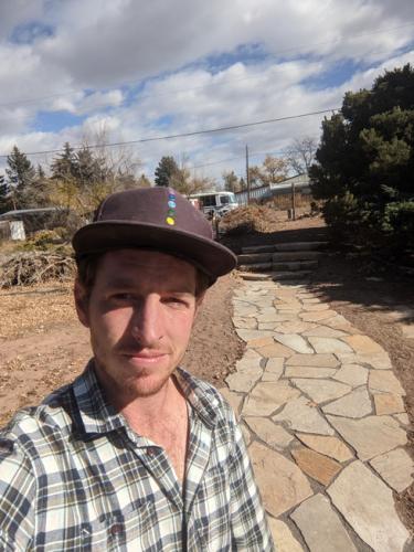 Linden Hunter of Linden Leaf Landscapes stands in front of a stone pathway project