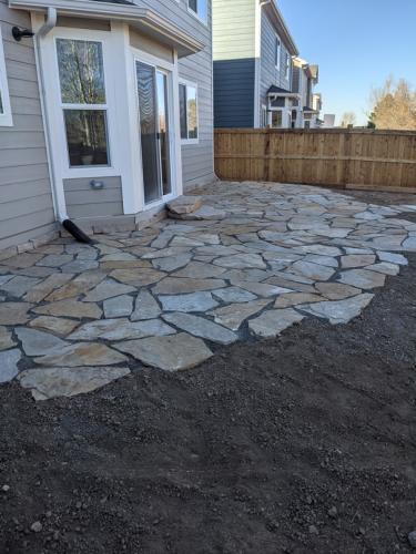 Custom flagston patio design by Linden Leaf Landscapes in Fort Collins, CO