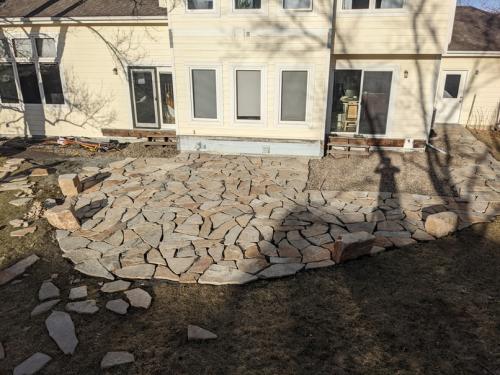 Custom flagstone patio and stone work by Linden Leaf Landscapes in Fort Collins