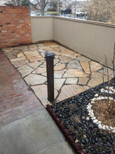 Custom hardscape stone patio design in Fort Collins