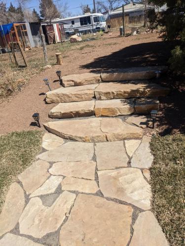 A custom stone pathway with steps in Fort Collins