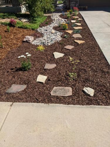 Mulch bed with rocks in Fort Collins