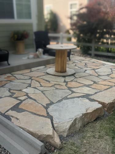 Custom stone patio with spool in Colorado