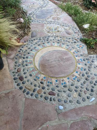 Custom patio design artwork with stones in Norther Colorado